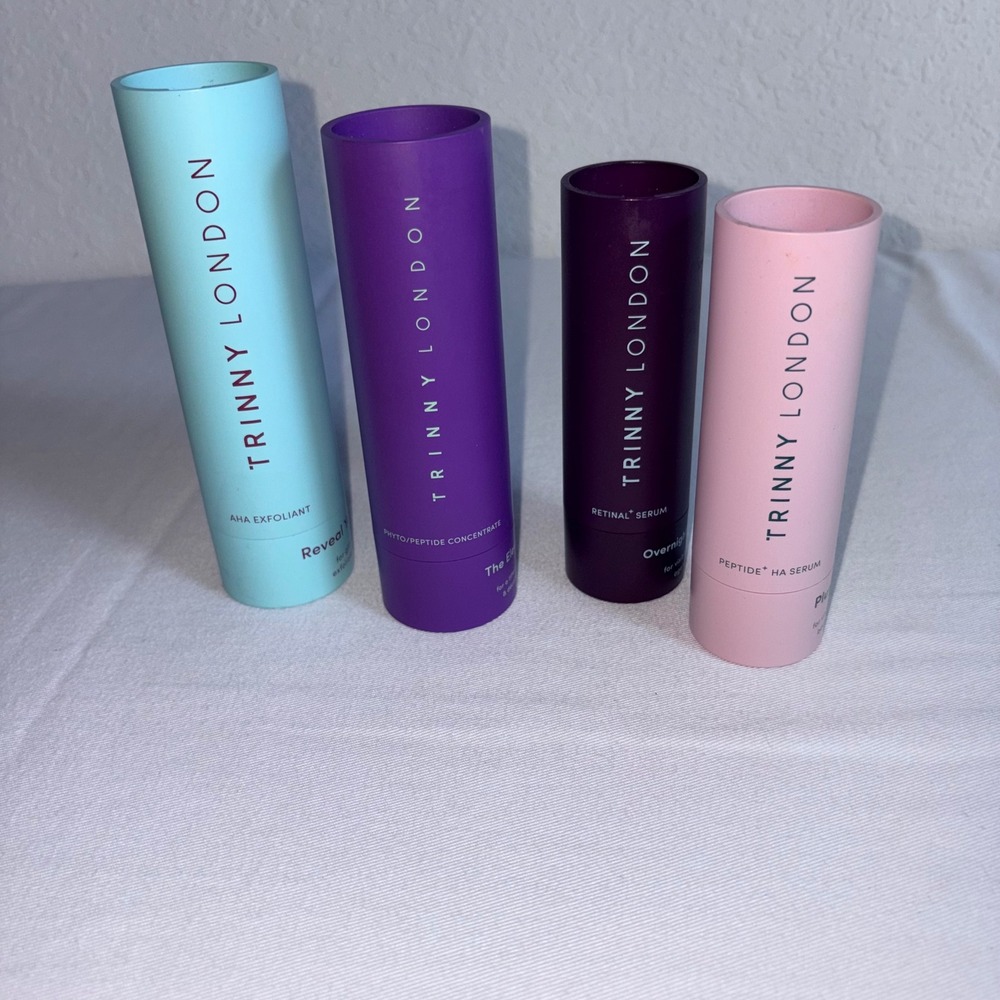 Trinny London Skincare Set Peptide HA Serum AHA Exfoliant Neck Concentrate empty